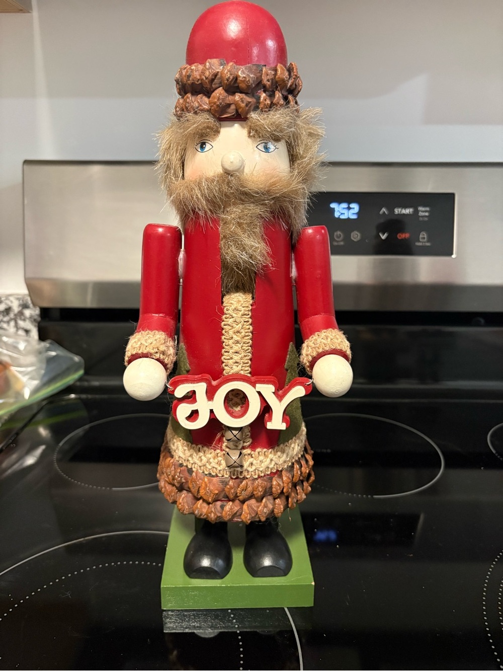 Wooden Red Nutcracker Holiday Figurine with JOY Sign